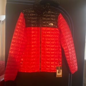 The North Face. Red, Size M. Condition: New